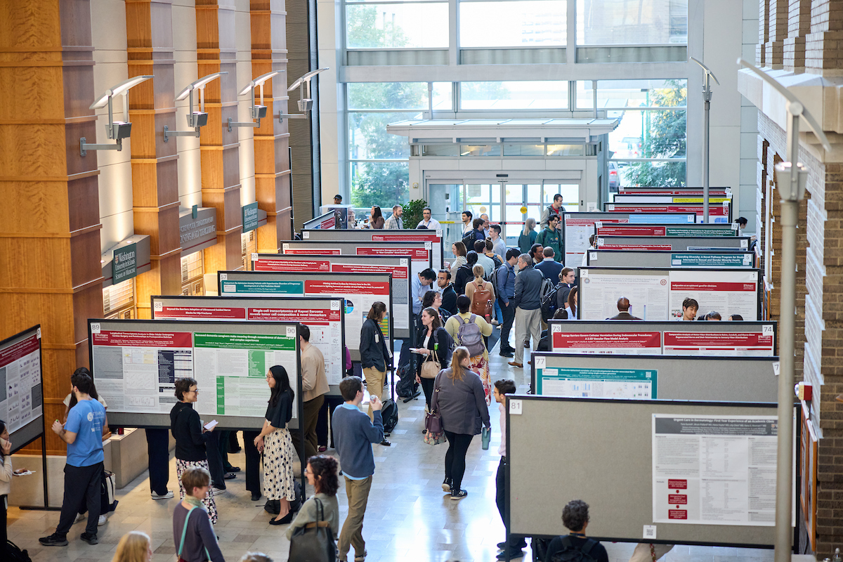 Medical students present their research work during the EXPLORE symposium plenary and poster session at FLTC on October 24, 2024. MATT MILLER/WASHINGTON UNIVERSITY SCHOOL OF MEDICINE